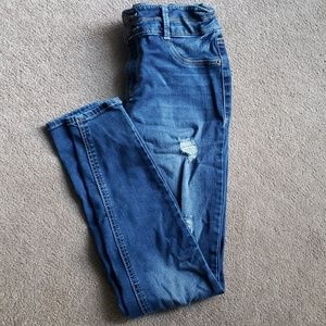 Kids triple button jeans.